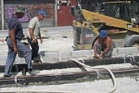 Postavljanje završnog sloja asfalta u Bulevaru