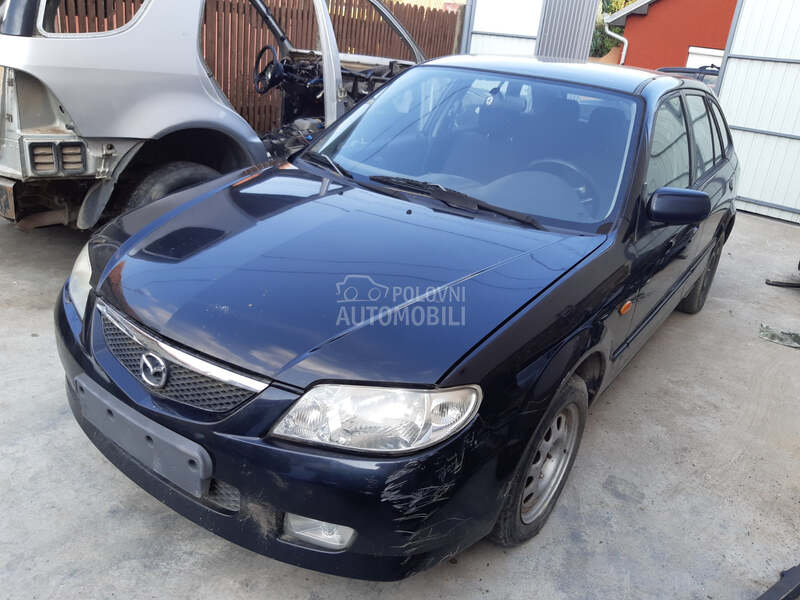 Delovi za Mazda 323 2001. god.