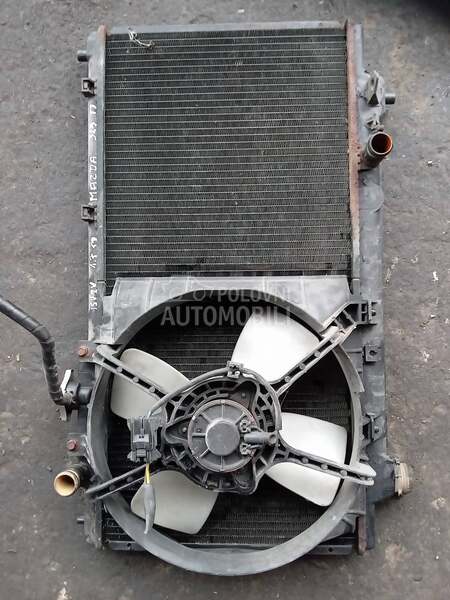 hladnjak vode. 1,7td za Mazda 323 za 1997. god.