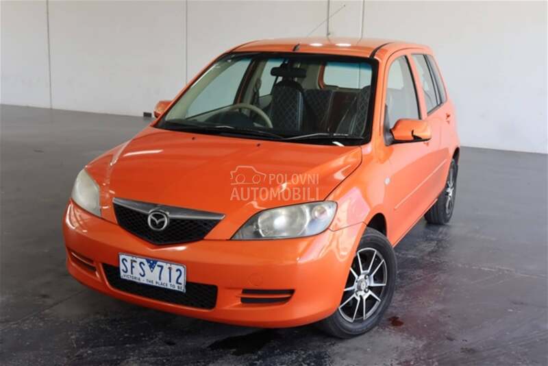 Centralna - sredisnja konzola za Mazda 2 od 2002. do 2007. god.