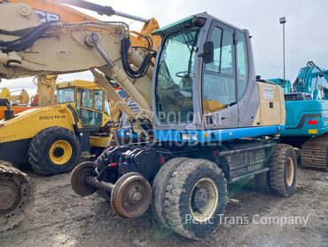 New Holland MH Plus dvoputi pruzni, 35.000 €, 2005. , Bager, Dizel, 98kW (133 KS), Beograd
