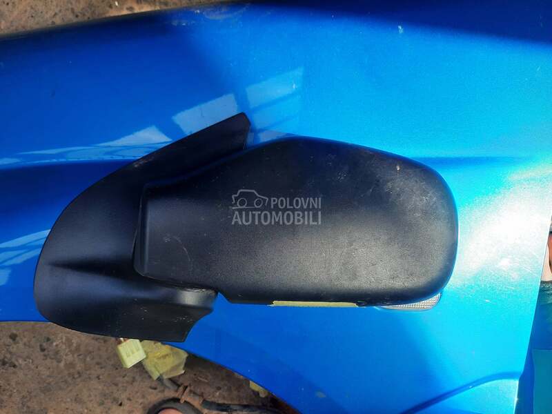 levi retrovizor za Subaru Justy