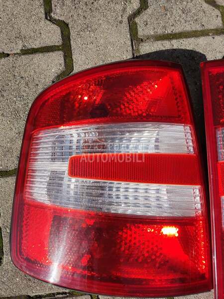 Leva lampa KARAVAN za Škoda Fabia