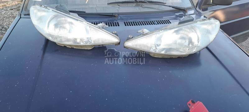 farovi h4 kao novi za Peugeot 206