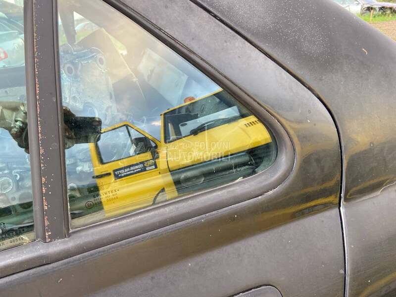 Leptir staklo zadnje levo za Peugeot 406 od 1998. do 2004. god.