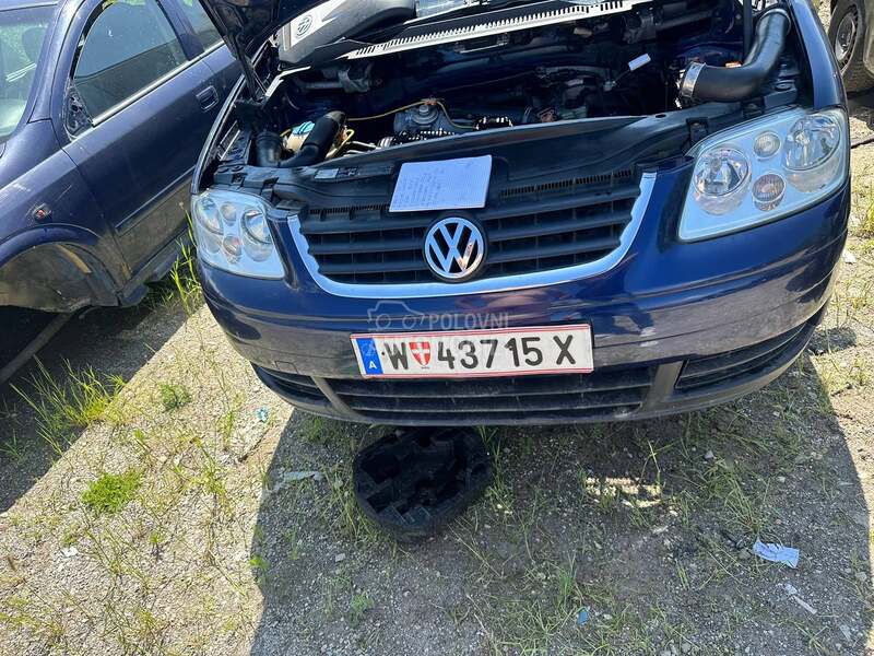 Farovi kompletni za Volkswagen Caddy, Touran od 2004. do 2007. god.