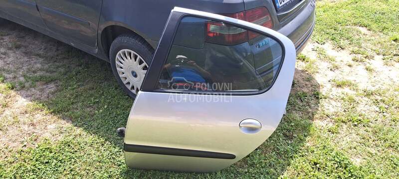 zadnja leva vrata siva za Peugeot 206