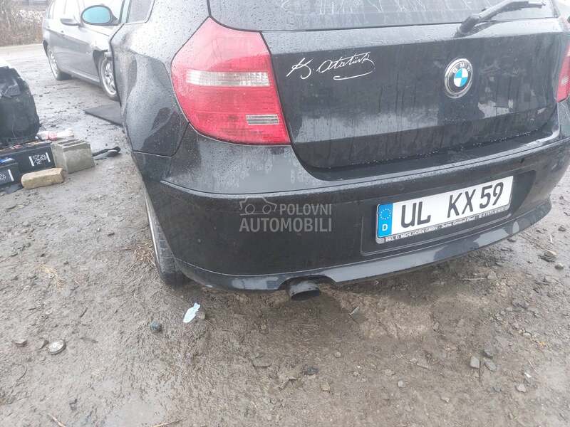 Branik zadnji lci e87 e81 za BMW 114, 116, 118 ... od 2007. do 2011. god.