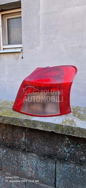 desna stop lampa orginal za Toyota Yaris