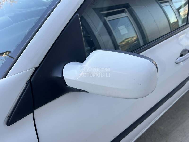 Retrovizor levi beli DV369 za Renault Megane od 2003. do 2009. god.