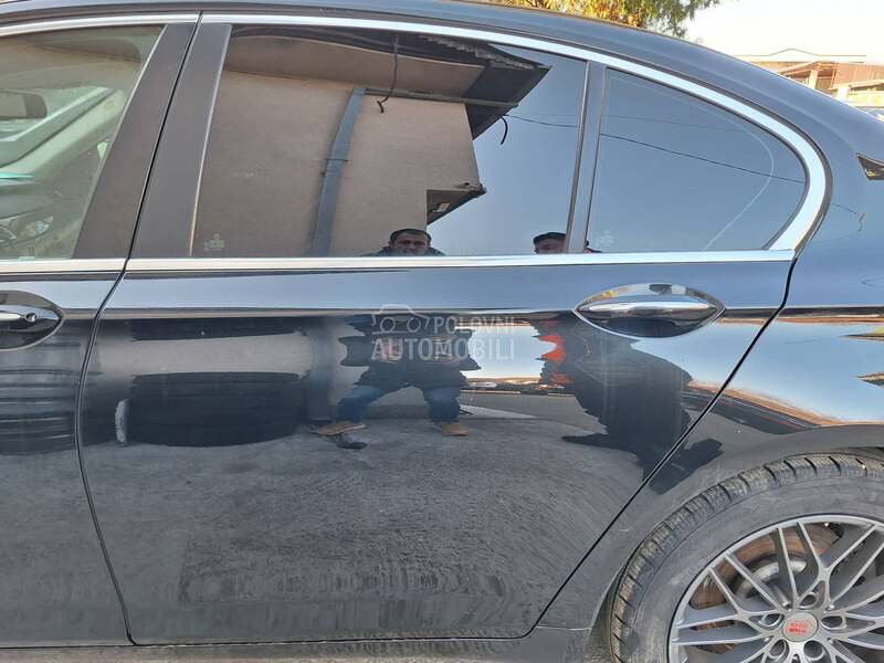 Vrata zadnja leva crna F01 za BMW 750, 730, 740 ... od 2008. do 2015. god.