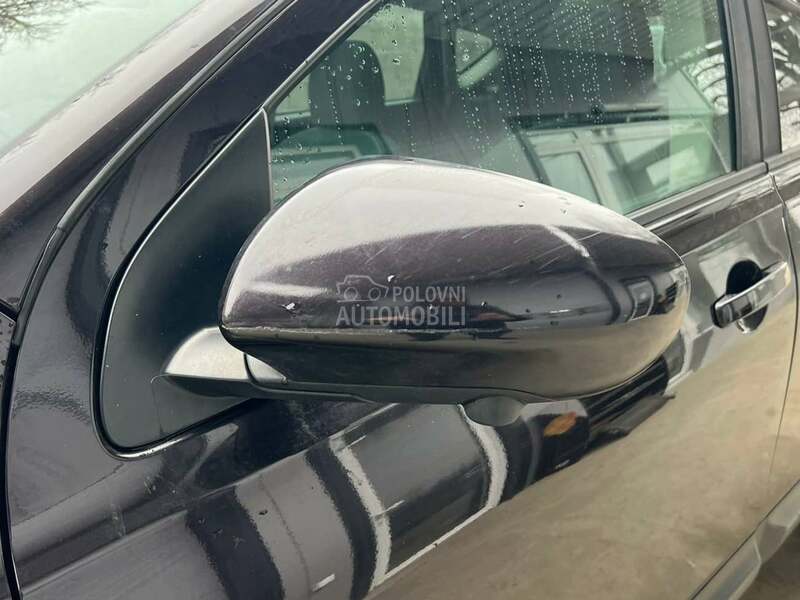 Retrovizor levi crni GABG za Nissan Qashqai od 2006. do 2013. god.
