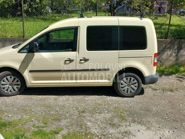 Volkswagen Caddy  (može zamena), 4.690 €, 2010. Monovolumen (MiniVan), Dizel | 1896 cm3, 232.000 km, 77kW (105 KS), Automatski / poluautomatski, 4/5 vrata, 7 sedišta, Veliki Mokri Lug
