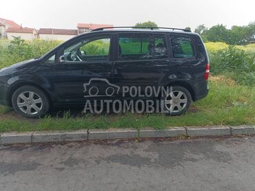 Volkswagen Touran 1.9 TDI, 3.600 €, 2006. Monovolumen (MiniVan), Dizel | 1896 cm3, 239.000 km, 77kW (105 KS), Manuelni 6 brzina, 4/5 vrata, 7 sedišta, Bežanijska Kosa