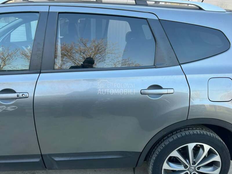 Vrata zadnja leva siva KADG za Nissan Qashqai + 2 od 2006. do 2013. god.