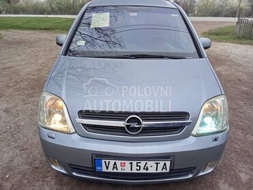 Opel Meriva 1.7 CDTI (može zamena), 1.580 €, 2004. Monovolumen (MiniVan), Dizel | 1686 cm3, 327.859 km, 74kW (101 KS), Manuelni 5 brzina, 4/5 vrata, 5 sedišta, Veliki Crljeni