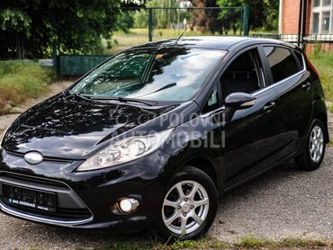Ford Fiesta Titanijum 1.4, 4.150 €, 2009. Limuzina, Benzin | 1388 cm3, 214.554 km, 71kW (97 KS), Manuelni 5 brzina, 4/5 vrata, 5 sedišta, Kraljevo
