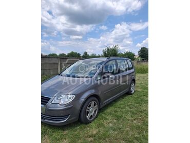Volkswagen Touran 1.4 TSI, 4.350 €, 2009. Monovolumen (MiniVan), Benzin | 1390 cm3, 225.000 km, 103kW (140 KS), Manuelni 6 brzina, 4/5 vrata, 7 sedišta, Titel