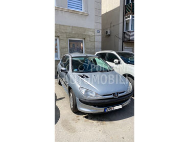 Peugeot 206 1.4, 1.250 €, 2004. Hečbek, Benzin | 1360 cm3, 210.846 km, 55kW (75 KS), Manuelni 5 brzina, 2/3 vrata, 5 sedišta, Beograd