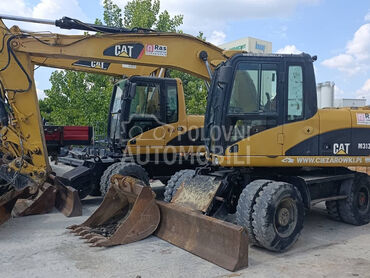CAT M313D, 30.000 €, 2008. , Bager, Dizel, 102kW (139 KS), Zemun