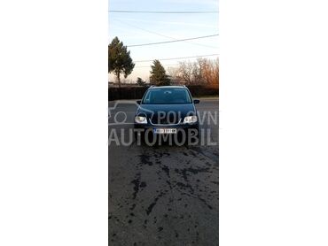 Volkswagen Touran R, 3.000 €, 2006. Monovolumen (MiniVan), Benzin | 1390 cm3, 260.000 km, 103kW (140 KS), Manuelni 6 brzina, 4/5 vrata, 5 sedišta, Beograd