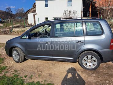 Volkswagen Touran 1.9 tdi, 2.150 €, 2003. Monovolumen (MiniVan), Dizel | 1900 cm3, 300.000 km, 74kW (101 KS), Manuelni 6 brzina, 4/5 vrata, 5 sedišta, Bor