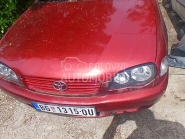Toyota Corolla 1.4 VVTi (može zamena), 600 €, 2001. Limuzina, Benzin | 1398 cm3, 290.000 km, 71kW (97 KS), Manuelni 5 brzina, 4/5 vrata, 5 sedišta, Beograd