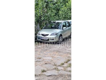 Mazda 2 1.2, 1.200 €, 2005. Limuzina, Benzin | 1242 cm3, 202.000 km, 55kW (75 KS), Manuelni 5 brzina, 4/5 vrata, 5 sedišta, Beograd