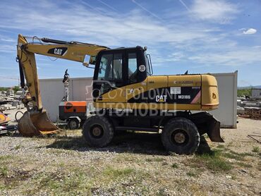 CAT M 316D, 30.000 €, 2009. , Bager, Dizel, 6600 cm3, 118kW (160 KS), Automatski menjač, Veternik