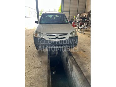 Mazda Tribute crko motor, 1.250 €, 2005. Džip/SUV, Benzin + Gas (TNG) | 2000 cm3, 250.000 km, 73kW (99 KS), Manuelni 5 brzina, 4/5 vrata, 5 sedišta, Temerin