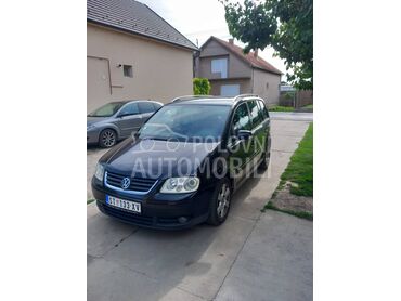 Volkswagen Touran tdi, 2.550 €, 2004. Monovolumen (MiniVan), Dizel | 1968 cm3, 300.000 km, 100kW (136 KS), Manuelni 6 brzina, 4/5 vrata, 5 sedišta, Vojka
