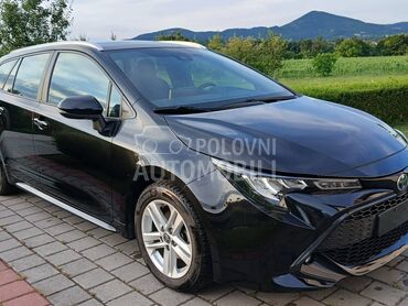 Toyota Corolla, 18.400 €, 2022. Karavan, Hibridni pogon (benzin) | 1835 cm3, 203.800 km, 72kW (98 KS), Automatski / poluautomatski, 4/5 vrata, 5 sedišta, Čačak