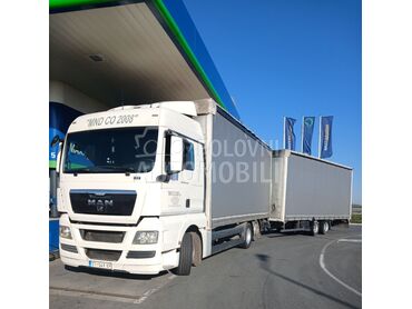 MAN TGX26.440EEV i prikolica, 15.500 €, 2009. , 1.049.000 km, Sanduk sa ceradom, Dizel, 3000 cm3, Manuelni menjač, Beograd