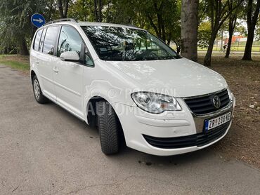 Volkswagen Touran 2.0 CNG, 3.290 €, 2009. Monovolumen (MiniVan), Benzin + Metan (CNG) | 1998 cm3, 199.000 km, 80kW (109 KS), Manuelni 5 brzina, 4/5 vrata, 5 sedišta, Zrenjanin