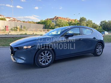 Mazda 3 G122, 15.200 €, 2022. Hečbek, Hibridni pogon (benzin) | 1998 cm3, 68.600 km, 90kW (122 KS), Manuelni 6 brzina, 4/5 vrata, 5 sedišta, Beograd