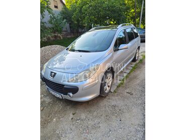 Peugeot 307 2.0 SW, 2.000 €, 2006. Karavan, Dizel | 1997 cm3, 242.156 km, 100kW (136 KS), Manuelni 6 brzina, 4/5 vrata, 7 sedišta, Novi Sad