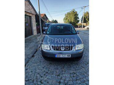 Volkswagen Touran 1.9 TDI, 3.300 €, 2005. Monovolumen (MiniVan), Dizel | 1896 cm3, 242.000 km, 77kW (105 KS), Manuelni 6 brzina, 4/5 vrata, 7 sedišta, Smederevo