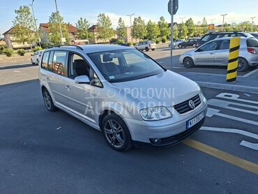Volkswagen Touran 1.9, 3.500 €, 2006. Monovolumen (MiniVan), Dizel | 1896 cm3, 215.500 km, 77kW (105 KS), Manuelni 6 brzina, 4/5 vrata, 7 sedišta, Niš