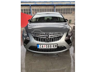 Opel Zafira Tourer (može zamena), 6.650 €, 2013. Monovolumen (MiniVan), Benzin + Metan (CNG) | 1598 cm3, 216.768 km, 110kW (150 KS), Manuelni 6 brzina, 4/5 vrata, 5 sedišta, Zaječar