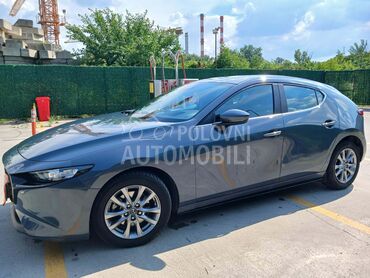 Mazda 3 G122, 15.300 €, 2022. Hečbek, Hibridni pogon (benzin) | 1992 cm3, 126.053 km, 90kW (122 KS), Manuelni 6 brzina, 4/5 vrata, 5 sedišta, Beograd