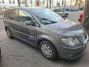 Volkswagen Touran 2.0, 4.000 €, 2008. Monovolumen (MiniVan), Benzin + Metan (CNG) | 1984 cm3, 245.680 km, 80kW (109 KS), Manuelni 5 brzina, 4/5 vrata, 5 sedišta, Beograd