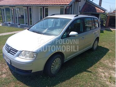 Volkswagen Touran 1.9 tdi (može zamena), 2.550 €, 2005. Monovolumen (MiniVan), Dizel | 1895 cm3, 250.000 km, 77kW (105 KS), Manuelni 6 brzina, 4/5 vrata, 5 sedišta, Kraljevo