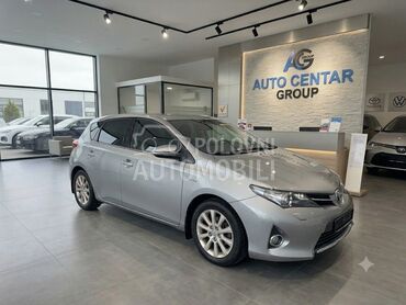 Toyota Auris 1,8 HYBRID, 8.190 €, 2014. Hečbek, Hibridni pogon (benzin) | 1798 cm3, 271.000 km, 73kW (99 KS), Automatski / poluautomatski, 4/5 vrata, 5 sedišta, Beograd