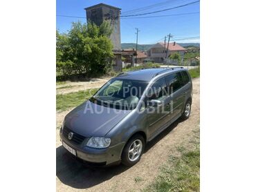 Volkswagen Touran, 1.990 €, 2003. Monovolumen (MiniVan), Dizel | 1896 cm3, 234.000 km, 74kW (101 KS), Manuelni 6 brzina, 4/5 vrata, 5 sedišta, Kragujevac