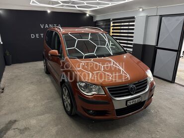 Volkswagen Touran CROSS 1.4 TSI DSG, 4.700 €, 2008. Monovolumen (MiniVan), Benzin | 1390 cm3, 239.884 km, 125kW (170 KS), Automatski / poluautomatski, 4/5 vrata, 7 sedišta, Jagodina