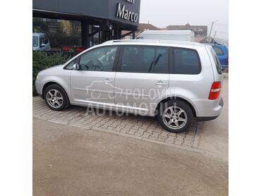 Volkswagen Touran 2.0 tdi, 3.500 €, 2006. Monovolumen (MiniVan), Dizel | 1968 cm3, 300.000 km, 103kW (140 KS), Manuelni 6 brzina, 4/5 vrata, 7 sedišta, Svilajnac