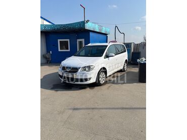 Volkswagen Touran, 2.000 €, 2007. Monovolumen (MiniVan), Benzin + Metan (CNG) | 2000 cm3, 423.000 km, 80kW (109 KS), Manuelni 5 brzina, 4/5 vrata, 5 sedišta, Beograd