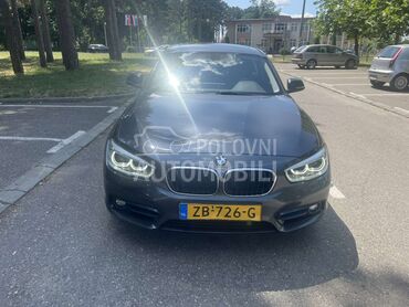 BMW 118 118i, 15.500 €, 2019. Hečbek, Benzin | 1499 cm3, 41.000 km, 103kW (140 KS), Automatski / poluautomatski, 4/5 vrata, 5 sedišta, Šabac