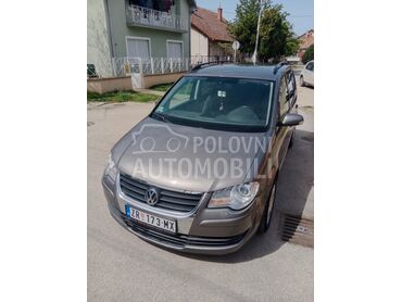 Volkswagen Touran 2.0 TDI, 4.390 €, 2008. Monovolumen (MiniVan), Dizel | 1968 cm3, 250.576 km, 103kW (140 KS), Automatski / poluautomatski, 4/5 vrata, 5 sedišta, Zrenjanin