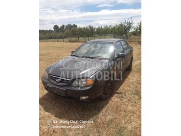 Kia Spectra, 200 €, 2003. Limuzina, Benzin | 1600 cm3, 231.231 km, 75kW (102 KS), Manuelni 5 brzina, 4/5 vrata, 5 sedišta, Ub